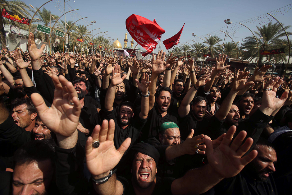 iraqi shias take part in commemorations on the tenth day of the mourning period of muharram which marks the day of ashura in the holy city of karbala photo afp