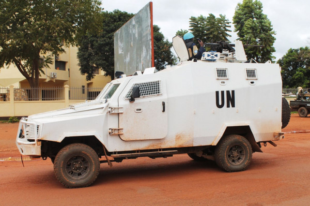 an armoured vehicle of the un peacekeeping mission in central african republic patrols in downtown bangui on october 11 2014 photo afp an armoured vehicle of the un peacekeeping mission in central african republic patrols in downtown bangui on october 11 2014 photo afp