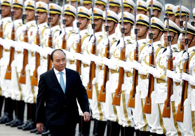 vietnam 039 s prime minister nguyen xuan phuc reviews navy soldiers 039 honour guard during a welcoming ceremony at the great hall of the people in beijing china september 12 2016 photo reuters