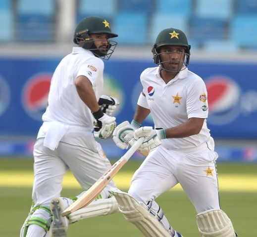 pakistani batsmen sami aslam r and azhar ali run between the wicket during the first test a day night match on the first day between pakistan and west indies at the dubai international cricket stadium in the gulf emirate on october 13 2016 pakistan captain misbah ul hq won the toss and opted to bat in the first test a day night affair with a pink ball against the west indies in dubai photo afp pakistani batsmen sami aslam r and azhar ali run between the wicket during the first test a day night match on the first day between pakistan and west indies at the dubai international cricket stadium in the gulf emirate on october 13 2016 pakistan captain misbah ul hq won the toss and opted to bat in the first test a day night affair with a pink ball against the west indies in dubai photo afp