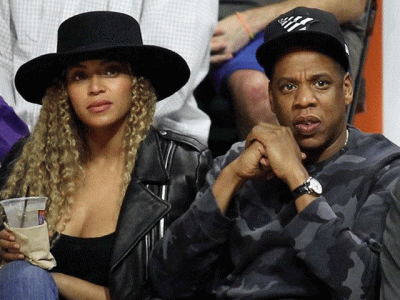 beyonce jay z to adopt child