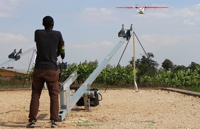 a technician of california based robotics company zipline launches a drone on october 12 2016 in muhanga 50 kilometres 31 miles west of the capital kigali photo afp a technician of california based robotics company zipline launches a drone on october 12 2016 in muhanga 50 kilometres 31 miles west of the capital kigali photo afp