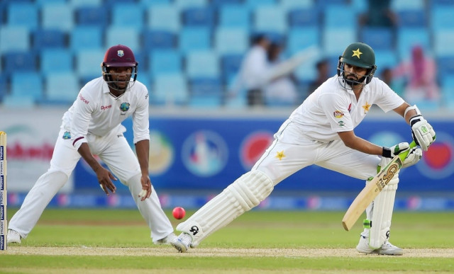 azhar ali became the first centurion in a day night test on thursday photo afp