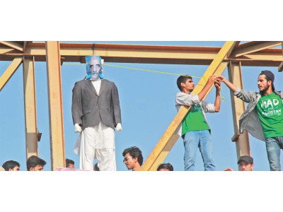 in bid for attention protesters hang khursheed shah s effigy from bridge