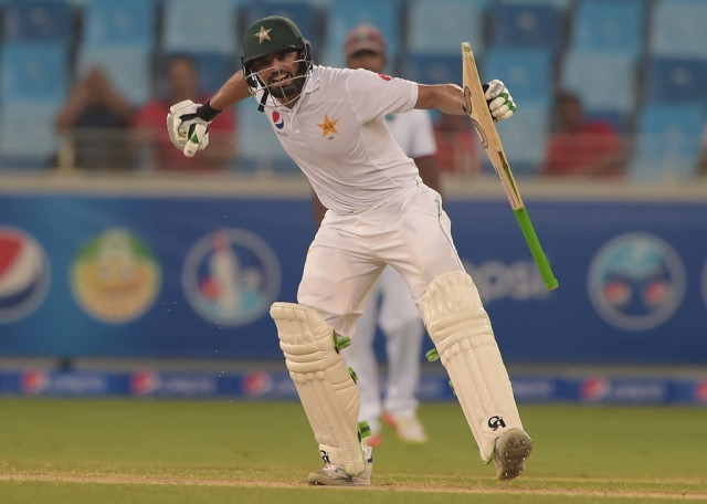 azhar ali celebrates scoring triple hundred in dubai on october 14 2016 photo afp
