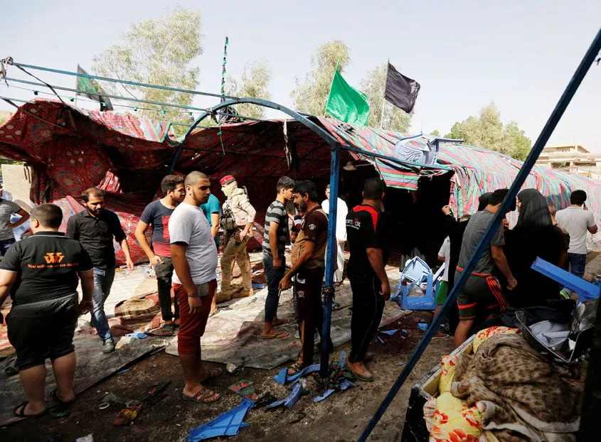 people gather at the site of a suicide bomb attack in the city 039 s northern al shaab district in baghdad iraq october 15 2016 photo reuters people gather at the site of a suicide bomb attack in the city 039 s northern al shaab district in baghdad iraq october 15 2016 photo reuters