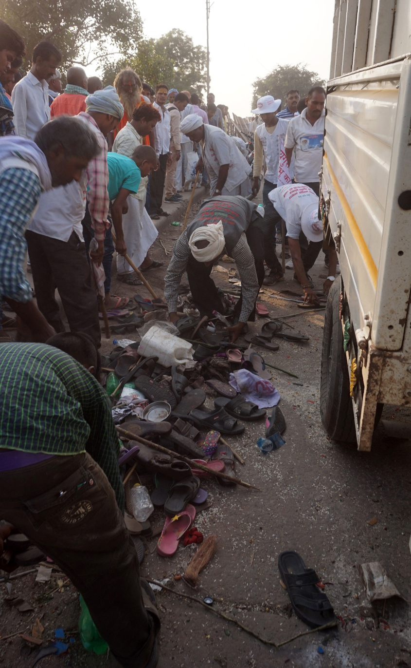 indian bystanders gather near the scene of a stampede in varanasi on october 15 2016 photo afp