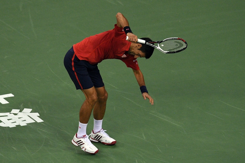 novak djokovic smashes his racket in shanghai on october 15 2016 photo afp