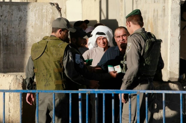 palestinians are checked at an israeli checkpoint between the west bank town of bethlehem and jerusalem photo afp file palestinians are checked at an israeli checkpoint between the west bank town of bethlehem and jerusalem photo afp file