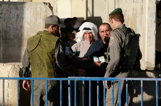 palestinians are checked at an israeli checkpoint between the west bank town of bethlehem and jerusalem photo afp file palestinians are checked at an israeli checkpoint between the west bank town of bethlehem and jerusalem photo afp file