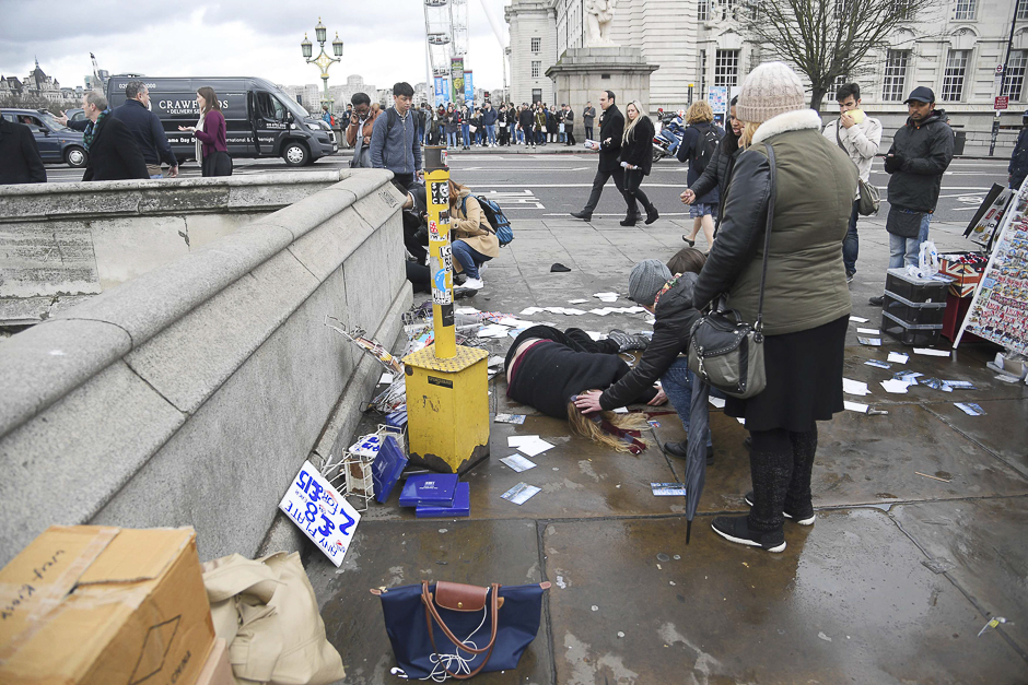 Injured people are assisted after the incident. PHOTO: REUTERS