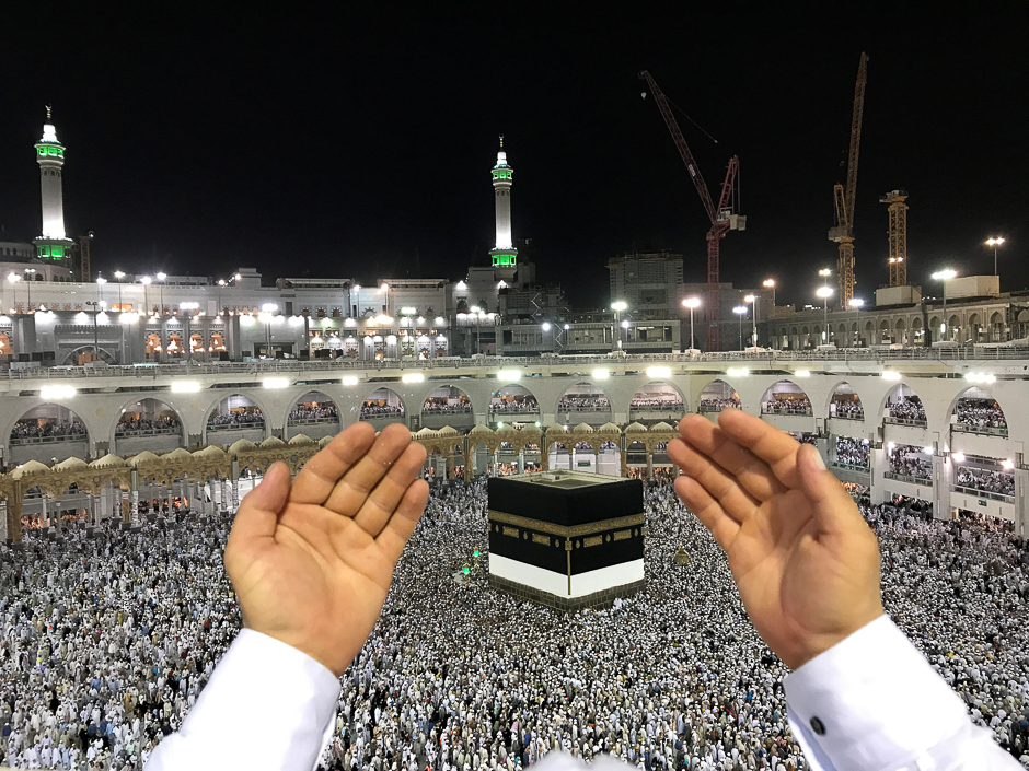 a pilgrim prays in front of the holy kaaba ahead of the haj photo reuters