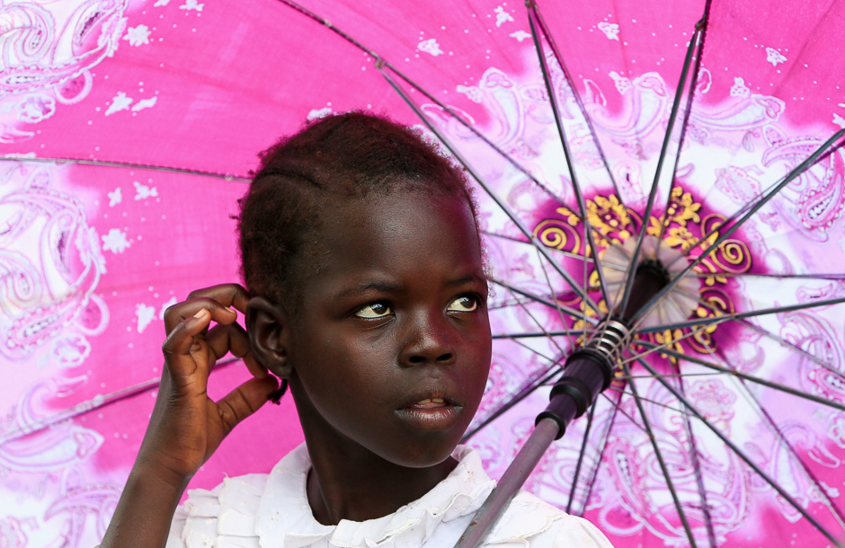 A refugee girl from South Sudan waits to receive food from the World Food Program (WFP) in Palorinya settlement in Moyo district northern Uganda. PHOTO: REUTERS