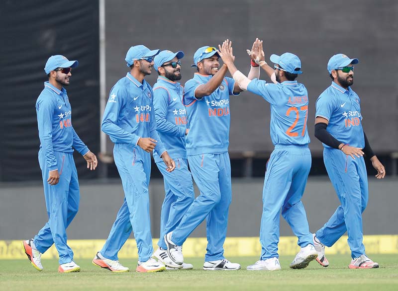 indian players celebrate after pandya dismissed ronchi to leave the visitors in deep trouble at 48 5 photo afp