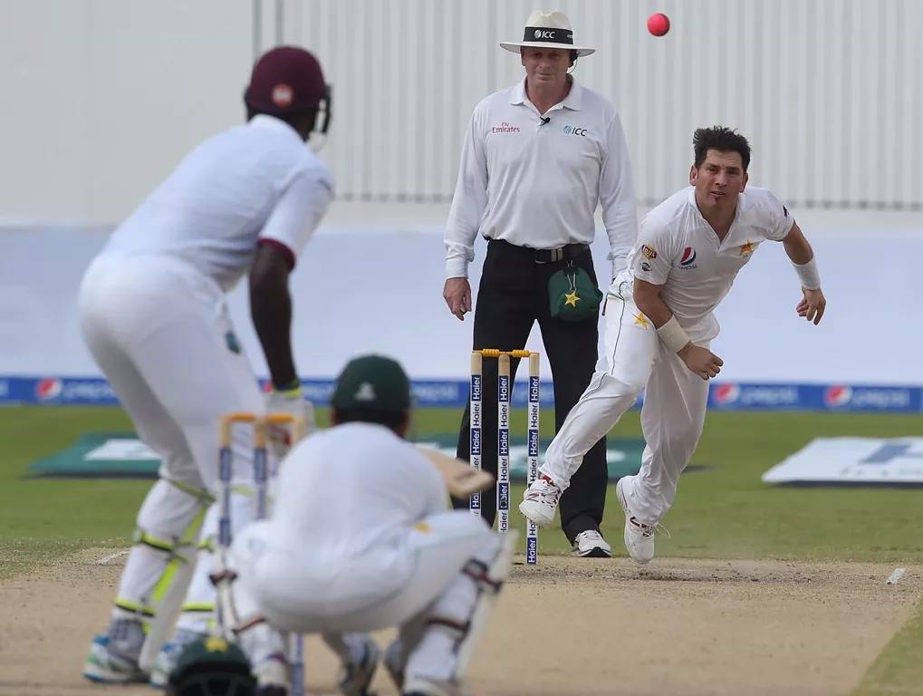 yasir shah r delivers the ball on the fourth day of first day night test on october 16 2016 photo afp yasir shah r delivers the ball on the fourth day of first day night test on october 16 2016 photo afp