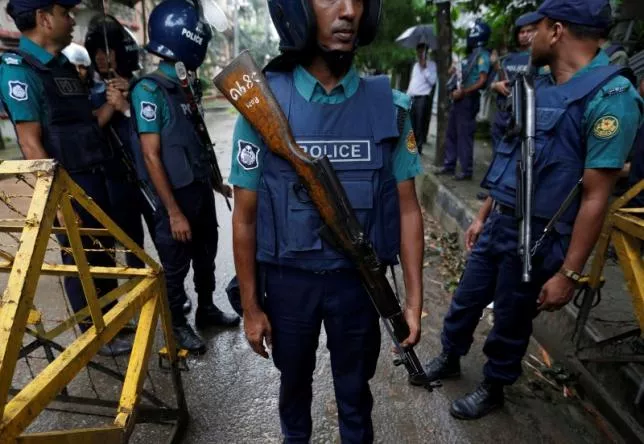 policemen stand guard along a road leading to the holey artisan bakery and the o 039 kitchen restaurant after gunmen attacked in dhaka bangladesh july 3 2016 photo reuters policemen stand guard along a road leading to the holey artisan bakery and the o 039 kitchen restaurant after gunmen attacked in dhaka bangladesh july 3 2016 photo reuters