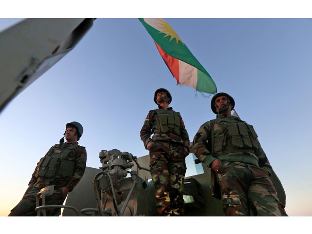 iraqi kurdish peshmerga fighters hold a position on the top of mount zardak about 25 kilometres east of mosul on october 17 2016 photo afp