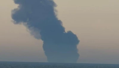 black smoke rises at sea near the strait of hormuz photo anadolu agency