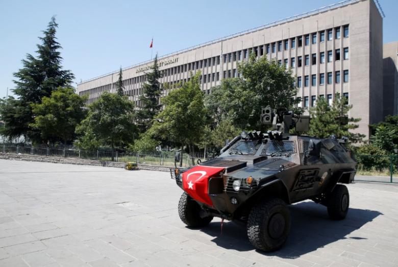 members of police special forces keep watch from an armored vehicle in front of the justice palace in ankara turkey july 18 2016 photo reuters