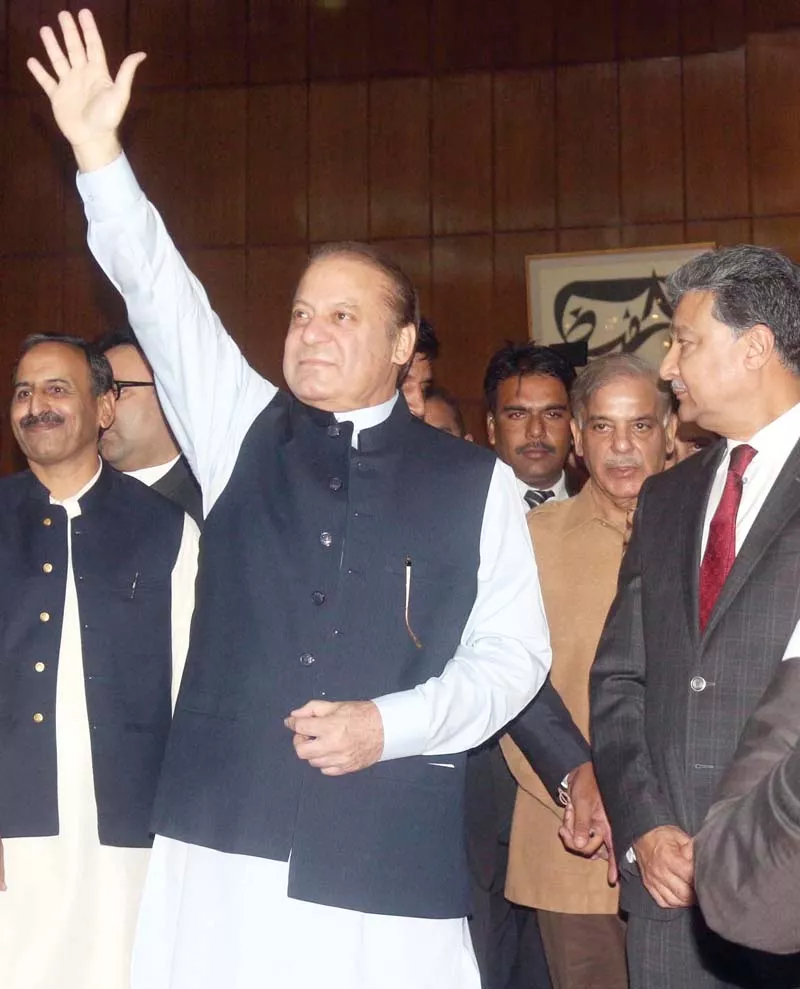 pm nawaz waves to party members at the intraparty polls photo inp pm nawaz waves to party members at the intraparty polls photo inp