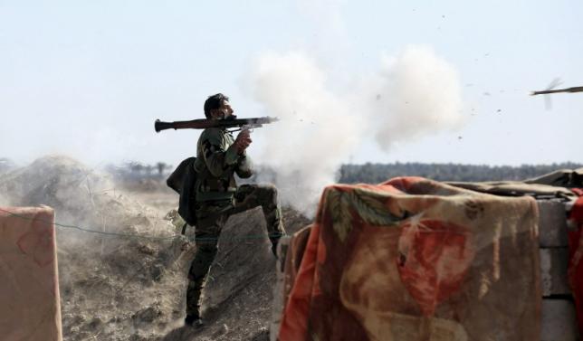 an iraqi soldier launches a rocket propelled grenade towards islamic state militants west of falluja photo reuters