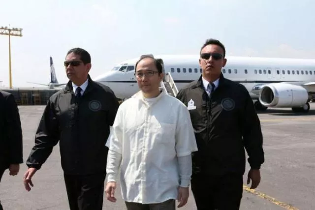 zhenli ye gon a businessman accused of working with drug cartels is escorted by interpol agents after arriving from the united states on a extradition flight in a hangar belonging to the office of the attorney general in mexico city mexico october 18 2016 photo reuters zhenli ye gon a businessman accused of working with drug cartels is escorted by interpol agents after arriving from the united states on a extradition flight in a hangar belonging to the office of the attorney general in mexico city mexico october 18 2016 photo reuters