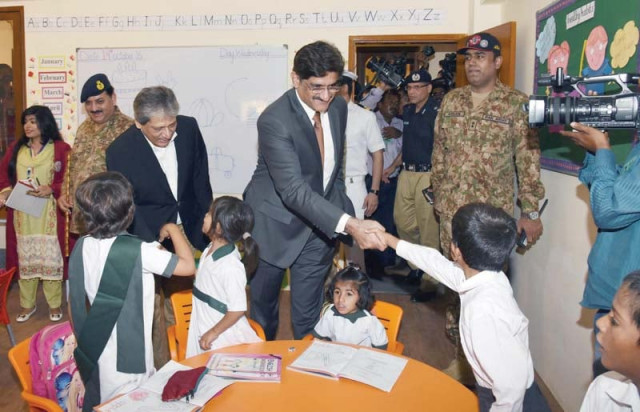 governor ishratul ebad khan and cm murad ali shah meet children at the newly inaugurated fwo model school and trauma centre on wednesday photo courtesy cm house governor ishratul ebad khan and cm murad ali shah meet children at the newly inaugurated fwo model school and trauma centre on wednesday photo courtesy cm house