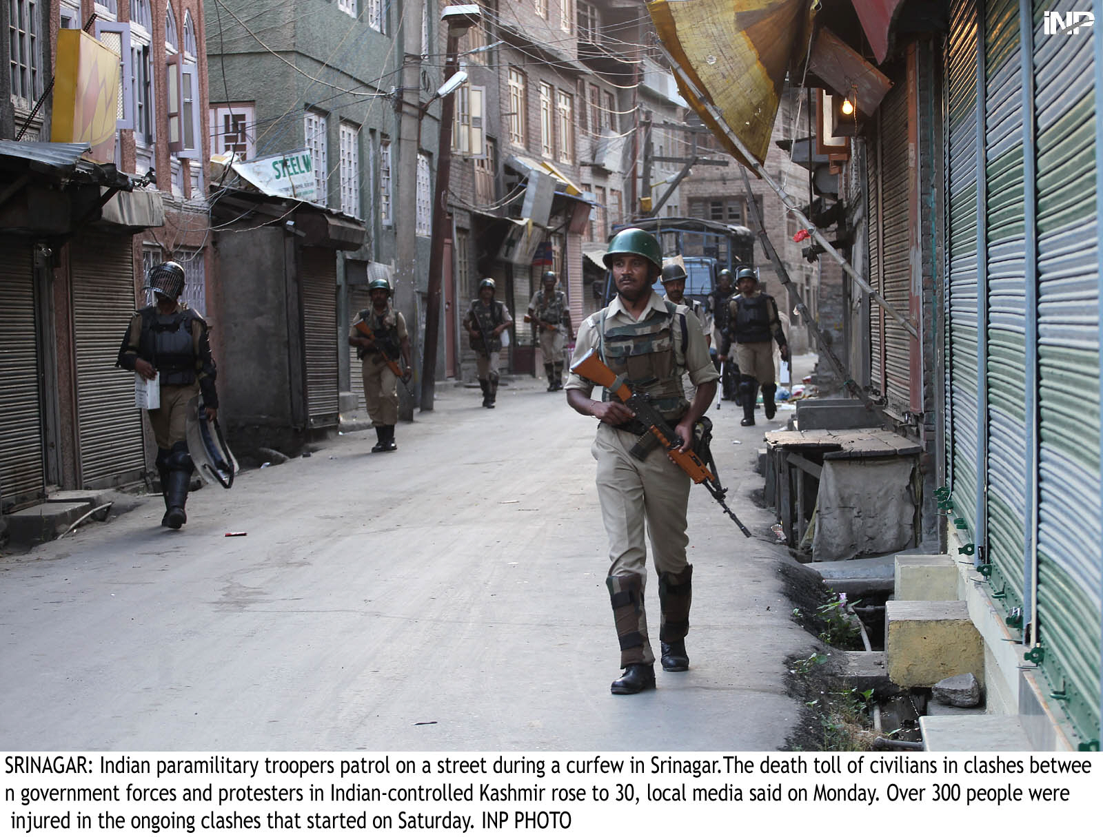 the foreign ministers noted demonstrations by unarmed kashmiris despite curfew in the wake of burhan wani s extrajudicial killing as referendum against india photo inp