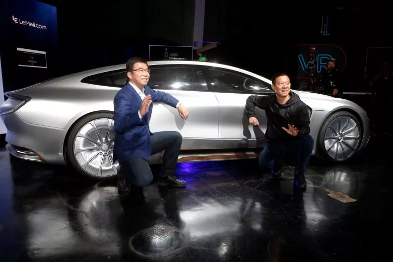 leeco ceo and founder yt jia r and co founder and global vice chairman lei ding pose in front of a lesee car photo reuters leeco ceo and founder yt jia r and co founder and global vice chairman lei ding pose in front of a lesee car photo reuters
