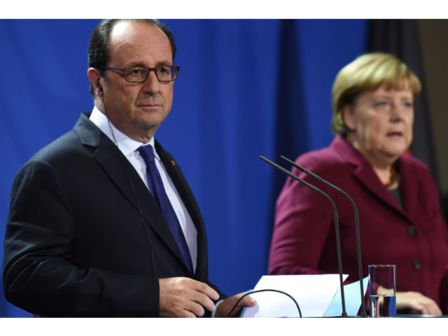 german chancellor angela merkel r speaks as french president francois hollande looks on during a press conference after a meeting of the leaders of russia ukraine france and germany on a new push for peace in eastern ukraine at the chancellery in berlin on october 19 2016 photo afp german chancellor angela merkel r speaks as french president francois hollande looks on during a press conference after a meeting of the leaders of russia ukraine france and germany on a new push for peace in eastern ukraine at the chancellery in berlin on october 19 2016 photo afp