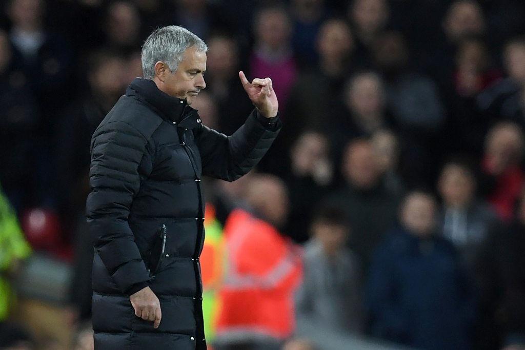 jose mourinho c at anfield in liverpool england on october 17 2016 photo afp