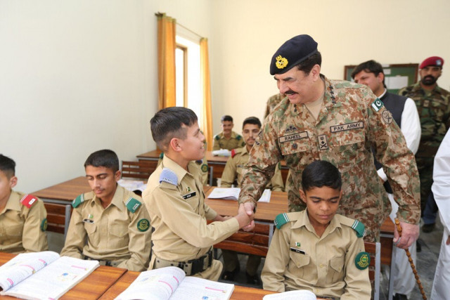 coas gen raheel sharif meets a pupil at newly constructed cadet college in south waziristan photo ispr coas gen raheel sharif meets a pupil at newly constructed cadet college in south waziristan photo ispr