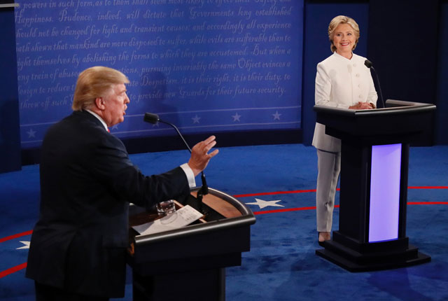 republican nominee donald trump l speaks as democratic nominee hillary clinton looks on during the final presidential debate at the thomas amp mack center on the campus of the university of las vegas in las vegas nevada on october 19 2016 photo afp