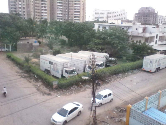 the vans that bear huge portraits of former prime minister benazir bhutto are rusting and no one is willing to share information about them photo express the vans that bear huge portraits of former prime minister benazir bhutto are rusting and no one is willing to share information about them photo express