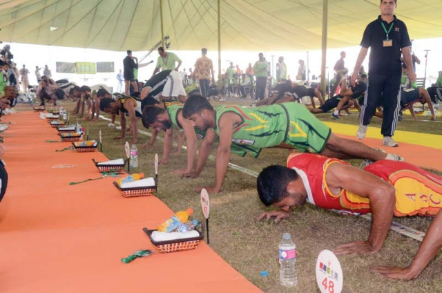 athletes from pakistan army and 14 other international armies can be seen competing against each other in the push ups event of the first international paces competition 2016 photo pakistan army