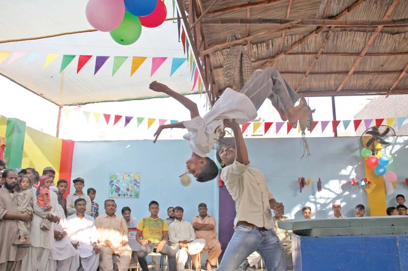 the children wowed the audience with their gymnastic skills and then educated them with a play on garbage disposal photos ayesha mir express