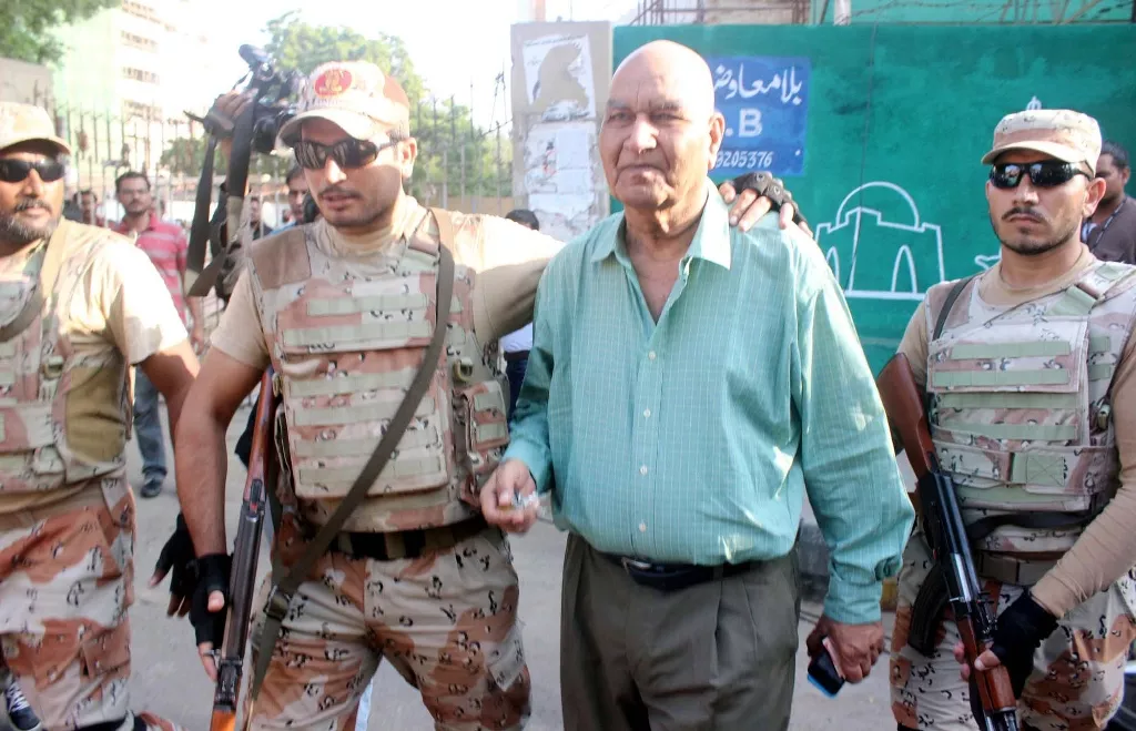 rangers personnel detain muttahida qaumi movement mqm london leader dr hasan zafar arif from outside the karachi press club on october 22 2016 photo ppi