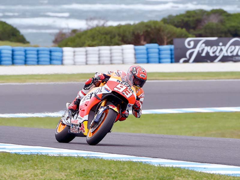 the two part qualifying session was played out under the threat of a downpour but marquez took the risk and ran with slick tyres on the dry track surface and his gamble paid off photo afp