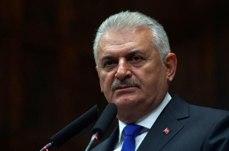 turkey 039 s prime minister binali yildirim addresses members of parliament from his ruling ak party akp during a meeting at the turkish parliament in ankara turkey october 4 2016 photo reuters