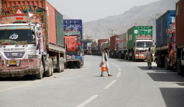 transit trucks stranded due to the border skirmishes between pakistan and afghanistan are parked on the side of the road leading to the border in torkham pakistan june 16 2016 photo reuters