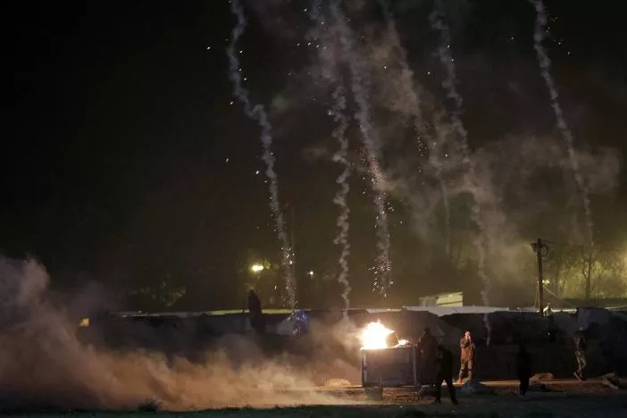 trailers from tear gas cannisters fired by french crs riot police are seen above migrants on the eve of their evacuation and transfer to reception centers in france and the dismantlement of the camp called the quot jungle quot in calais france october 23 2016 photo reuters trailers from tear gas cannisters fired by french crs riot police are seen above migrants on the eve of their evacuation and transfer to reception centers in france and the dismantlement of the camp called the quot jungle quot in calais france october 23 2016 photo reuters