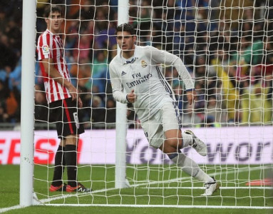 morata winner sends real top as atletico beaten at sevilla morata winner sends real top as atletico beaten at sevilla