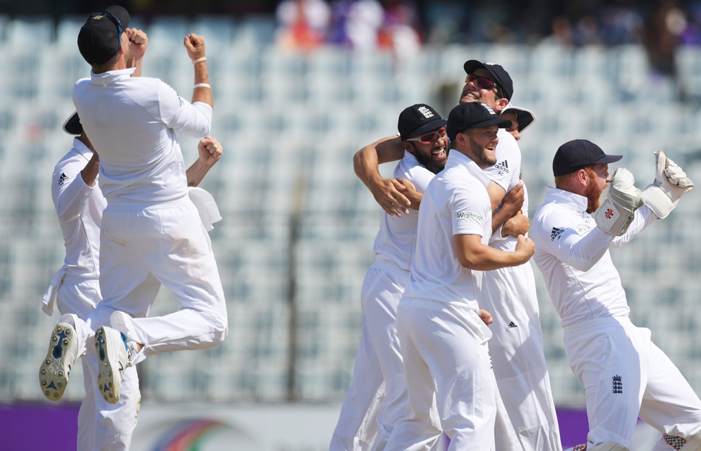 england 039 s players celebrate beating bangladesh at zahur ahmed chowdhury cricket stadium in chittagong on october 24 2016 photo afp