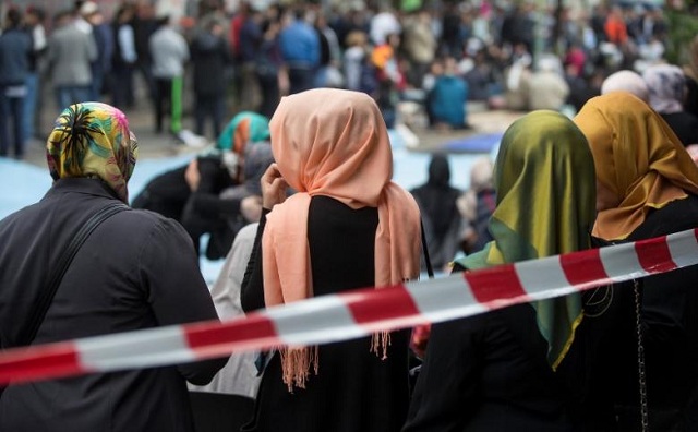 muslim women with headscarves wait after friday photo reuters