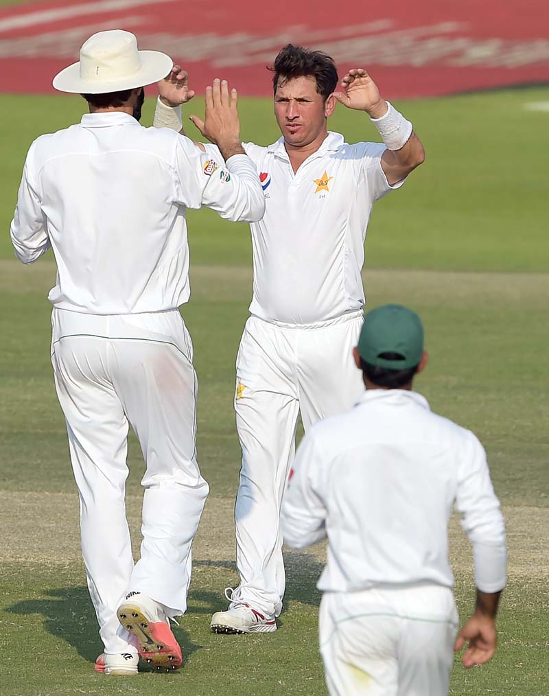 yasir shah was once again at it as he claimed 2 60 to leave west indies needing 285 runs on day five with just six wickets remaining photo afp