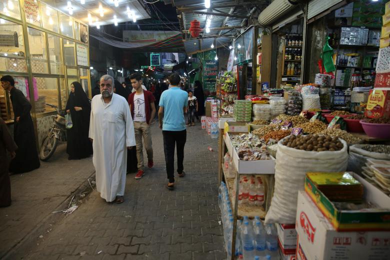 people walk at a market in kerbala southwest of baghdad iraq september 26 2016 photo reuters