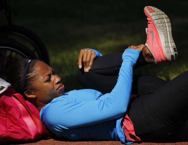 track and field sprint athlete allyson felix of the us who won an olympic gold medal in beijing stretches during her training photo reuters