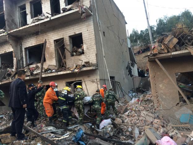 rescue workers search at site after an explosion hit a town in fugu county shaanxi province china october 24 2016 photo reuters