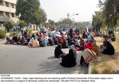 unpaid dues regular teachers join daily wagers in strike
