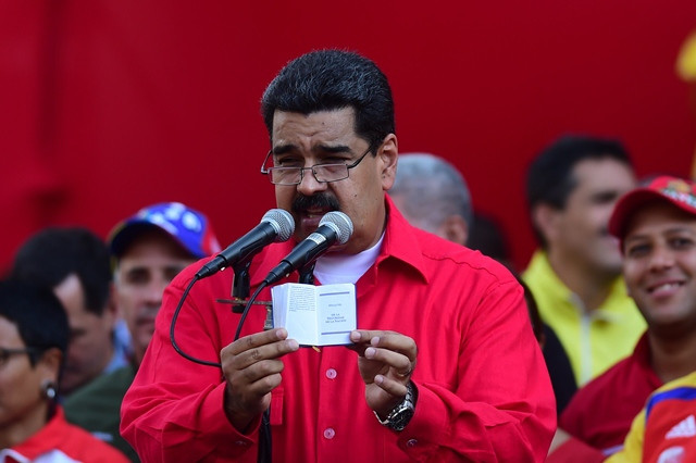 venezuelan president nicolas maduro who is resisting efforts by the opposition to remove him from power in a volatile political crisis delivers a speech to supporters in caracas on october 25 2016 the opposition is planning nationwide street protests for wednesday the day it was to have begun collecting the four million signatures needed to trigger a recall referendum against maduro but which electoral authorities blocked last week photo afp venezuelan president nicolas maduro who is resisting efforts by the opposition to remove him from power in a volatile political crisis delivers a speech to supporters in caracas on october 25 2016 the opposition is planning nationwide street protests for wednesday the day it was to have begun collecting the four million signatures needed to trigger a recall referendum against maduro but which electoral authorities blocked last week photo afp
